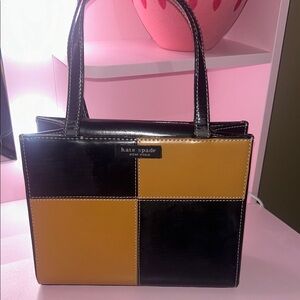 Kate Spade Black and Gold Mini purse